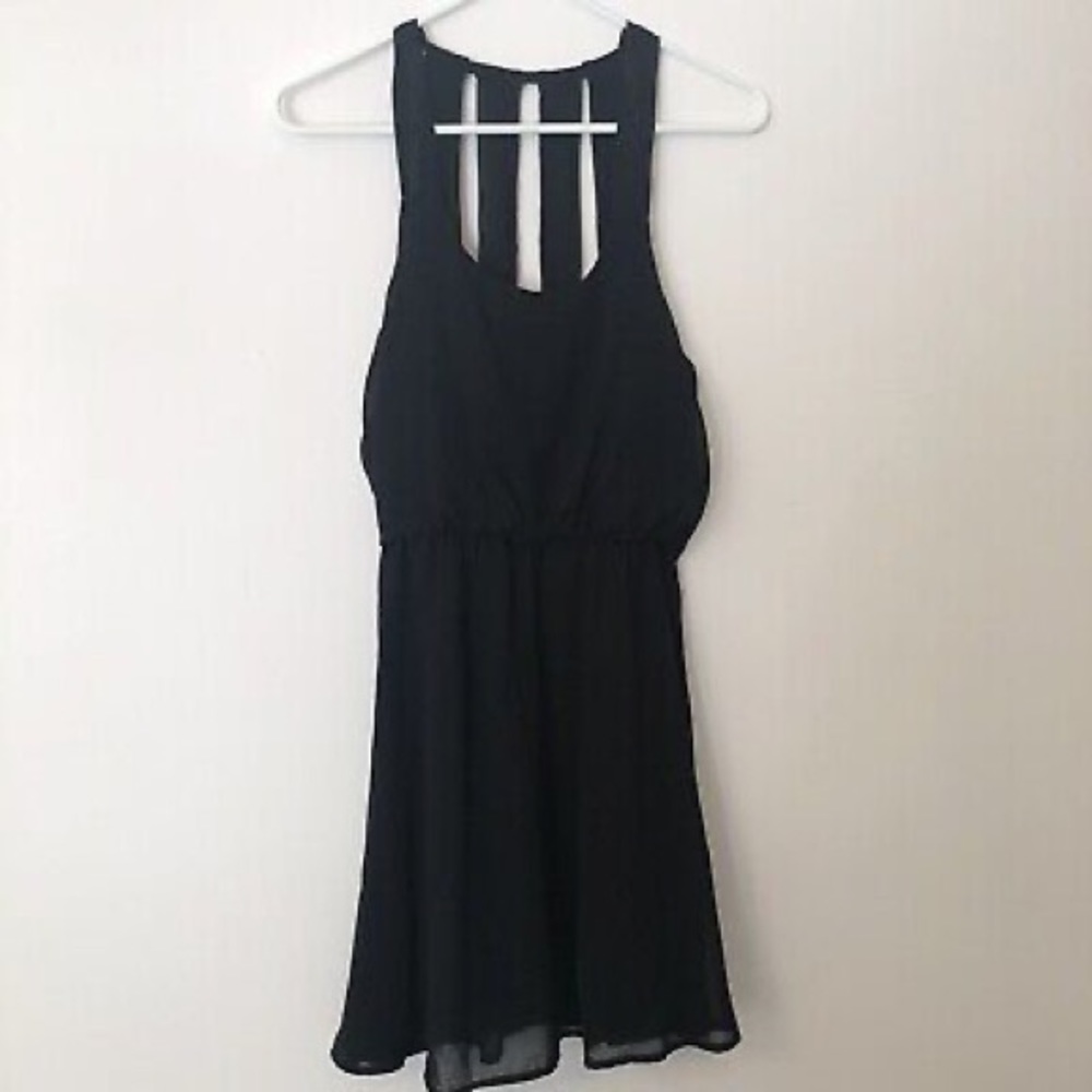 Nordstrom’s Dee Elle Strappy Blouson Black Dress
Size L